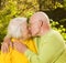 Kissing senior couple