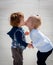 Kissing Toddlers, Side View, Standing