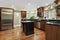 Kitchen with black and granite island