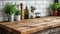 Kitchen brass utensils, chef accessories. Hanging kitchen with white tiles wall and wood tabletop.Green plant on kitchen