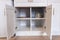 Kitchen cabinet with open doors
