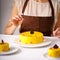 Kitchen chef decorated yellow cake