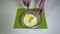 Kitchen. Close-up. A young woman is preparing food. Hands of the girl close-up. The woman is whipping the egg and yogurt