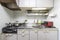 Kitchen counters and kitchen utensils in the room at the condominium