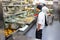 Kitchen crew work in the galley of a cruise ship in the Caribbean Sea