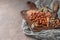 Kitchen cutting board with hazelnuts without shell, view from above