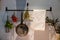 Kitchen decoration with hanging pots and pans