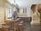 Kitchen and dining area in a log interior staircase to the second floor and a fireplace.