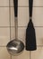 Kitchen Flipper and Ladle Hanging on The Wall