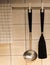 Kitchen Flipper and Ladle Hanging on The Wall