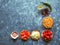 Kitchen - fresh colorful organic vegetables, top view. Grey stone worktop as background. Layout with free text copy space.