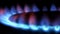 Kitchen gas burner flaming in interior