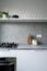 Kitchen with gray countertop and backsplash