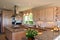 Kitchen interior of large spanish villa. With fresh flowers and fruit