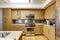 Kitchen interior with steel backsplash trim
