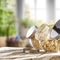 Kitchen interior with wooden table background and blurred view of sunny spring outside the window. Cereal in glass jars.