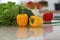 Kitchen interiors. Many vegetables and other meal at glass table are ready for been cooked soon