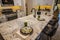 Kitchen Island With Granite Counter Top And Place Settings