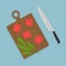 Kitchen knife and cutting board with tomatoes and salad leaves. Flat style.