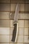 Kitchen knife hanging on a wall