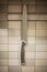 Kitchen knife hanging on a wall