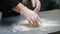 Kitchen - a man making a little piece of dough