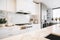 A kitchen with marble counter tops and white cabinets. AI generative image.