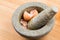 Kitchen mortar and pestle with crashed egg shell