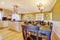 Kitchen room with green walls and dining table