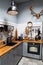 Kitchen in Scandinavian style. comfortable, practical interior. antlers on wall