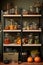 Kitchen shelves topped with lots of bottles and jars with canned food. Vegetables in jars.