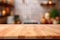 Kitchen space with kitchen utensils in blur and wooden table in foreground. Essence of warm and functional kitchen