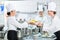 Kitchen staff in canteen preparing dishes