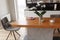 Kitchen still life with modern wooden table, candies and orchid on it