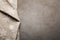 Kitchen stone table with towel. Top view with copy space. Concrete beige background with a touch of rust