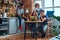 Kitchen in student dormitory. Group of interracial students engaged in education.