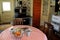 Kitchen table and appliances in old fashioned room of Strawberry Banke Museum, New Hampshire, 2017.