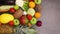 Kitchen table full with moving fresh organic and ripe healthy fruits and vegetables. Stop motion