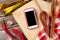 Kitchen table with ingredients, utensils and phone