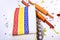 Kitchen towels with Romanian tricolor and a wooden spoon or stick, tools for the dumplings preparation. Shape of dumplings &
