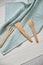 Kitchen utensils for cooking from natural and durable materials. A muslin towel of a beautiful light blue color, a