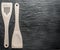 Kitchen utensils on a graphite background.