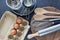 Kitchen utensils and ingredient concept, measuring cups with whisk, wooden spoon and fresh eggs.