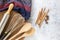 Kitchen utensils and ingredient concept, whisk, wooden spoon and rolling pin with traditional cloth.