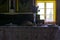 Kitchen utensils in the interior of old traditional rural wooden house.