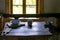 Kitchen utensils in the interior of old traditional rural wooden house.