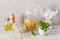 Kitchen utensils on modern simple counter, kitchenware jars with dry ingredients bowls