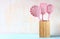 Kitchen utensils over wooden textured background