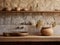 Kitchen water mixer tap on stone counter and wooden shelf with pottery above it