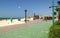 Kite beach. Panoramic view of Kite beach and jogging track on urban beach. Colorful touristic beach with write fine sand during da